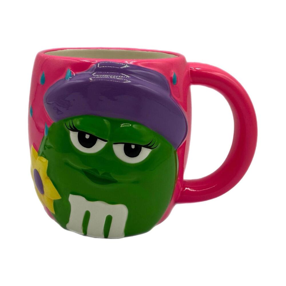 M&M Pink Mug with Green Character in Purple Hat